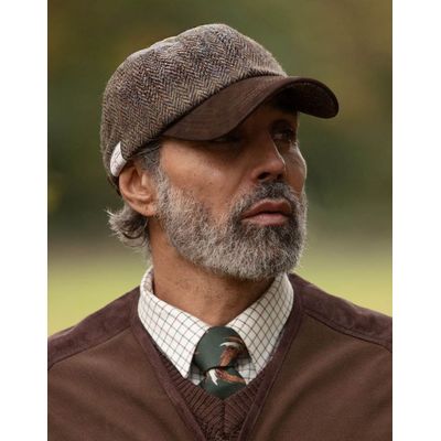 Foto van Walker and Hawkes Brungton Harris Tweed Baseball Cap met Suède Leren Klep